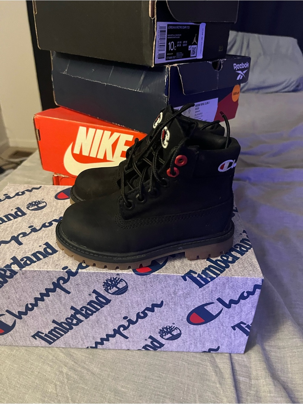 Timberland Kids Black Lace-Up Boots with Brown Outsole and Red Eyelets